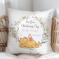 Decorative pillow with Winnie the Pooh and Piglet design, text 'On Your Christening Day Emily Smith', on a wicker chair.