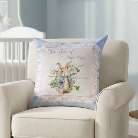 Decorative pillow with a rabbit illustration and text on a white background