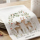 Personalized towel with deer design and text on a wooden table