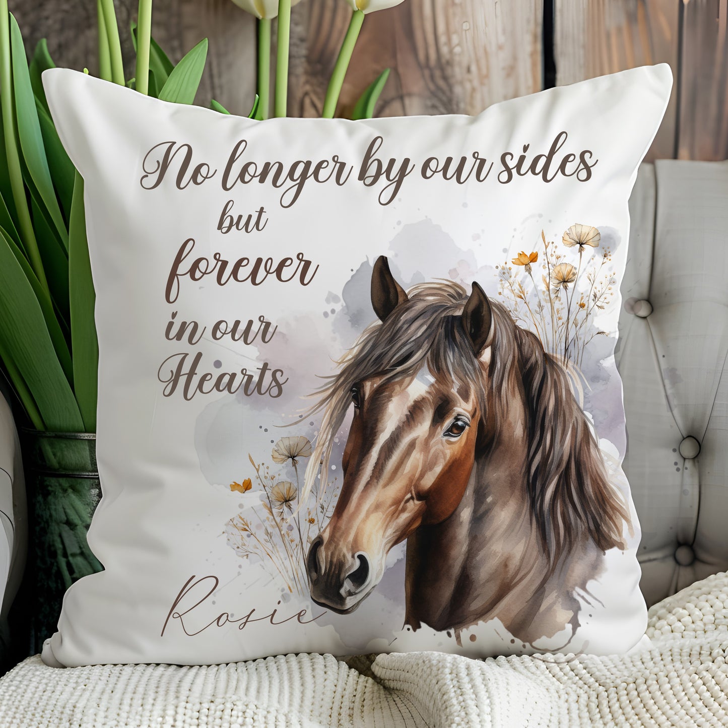 Decorative pillow with horse illustration and text on a couch