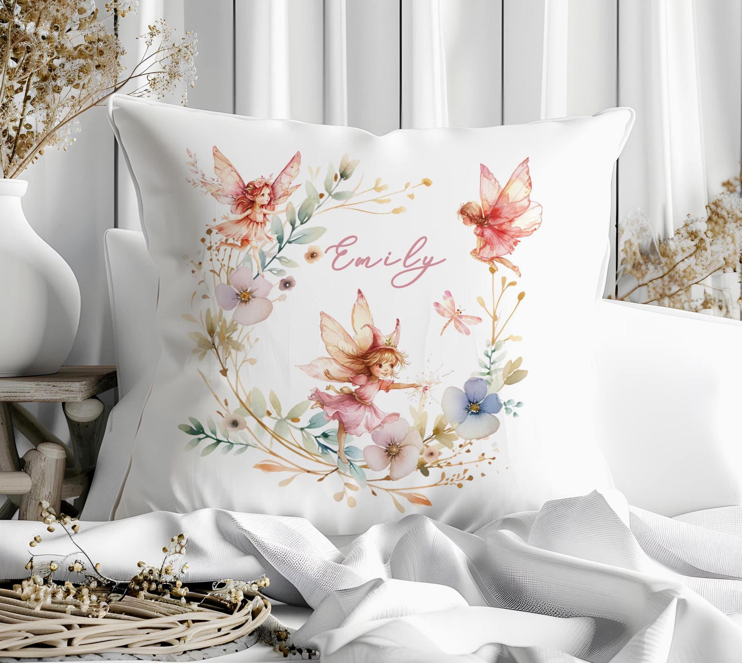 Decorative pillow with fairy design and name 'Emily' on a white background